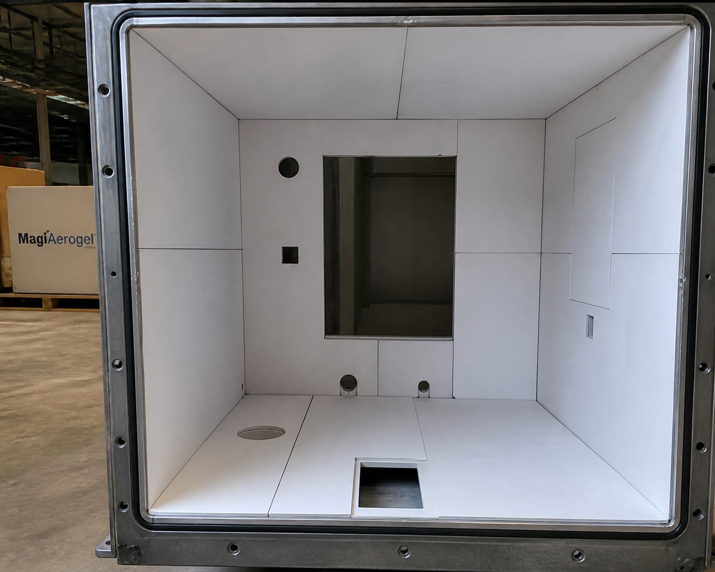 open metal enclosure lined with silica aerogel sheet panels